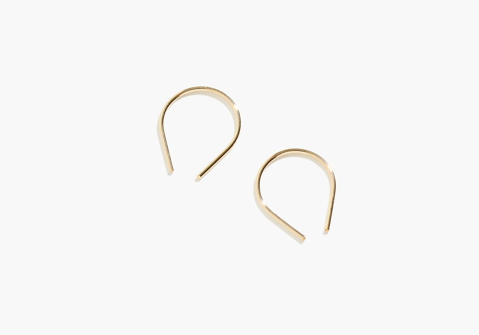 Minimalist gold fill Moab Arch Threader Earrings displayed on a clean white background.
