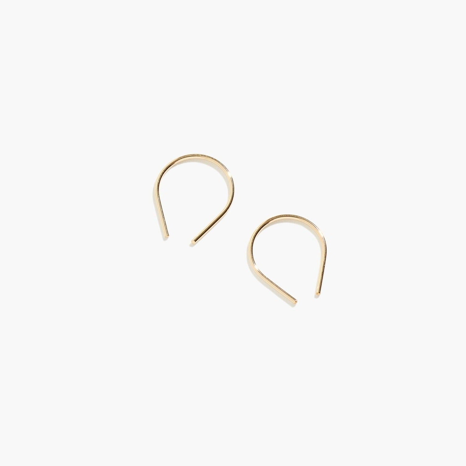 Minimalist gold fill Moab Arch Threader Earrings displayed on a clean white background.