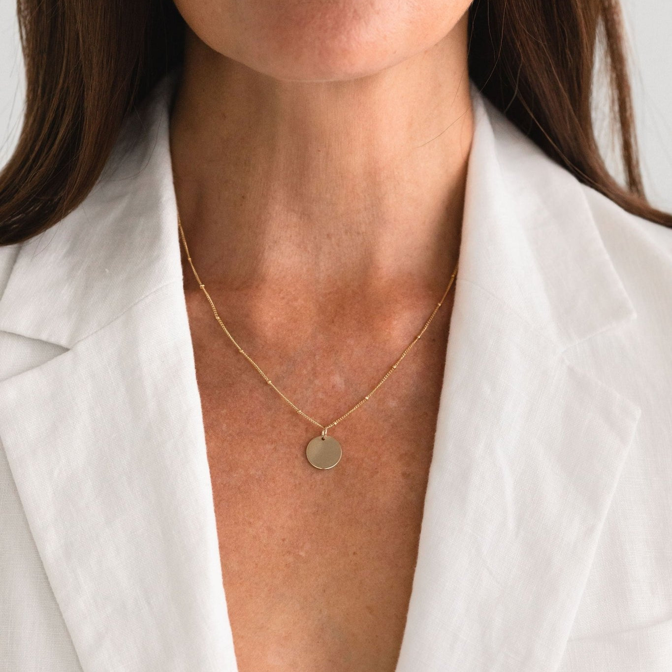 Model wearing the Dylan Link Pendant Necklace in gold fill by Sheena Marshall, showcasing its versatile and minimalist design.